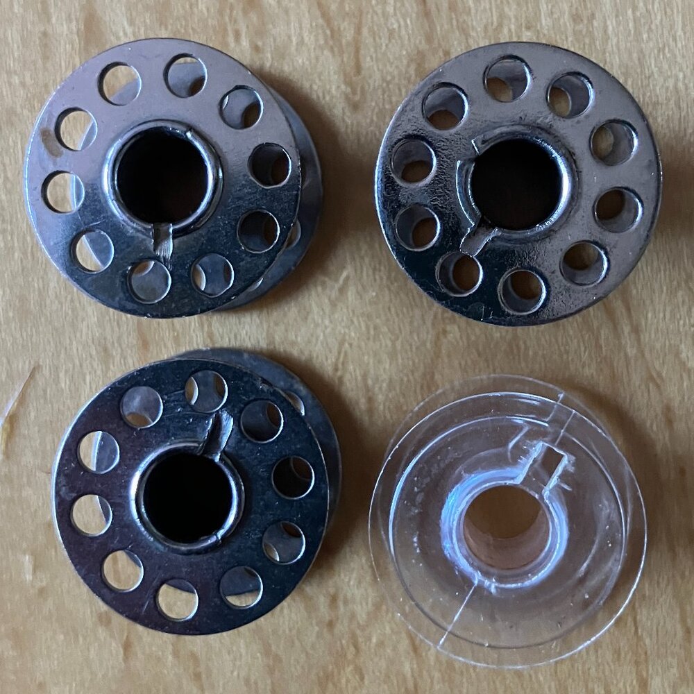 Lot of 4 Vintage / Standard Sewing Machine Bobbins (3 Metal, 1 Plastic)
